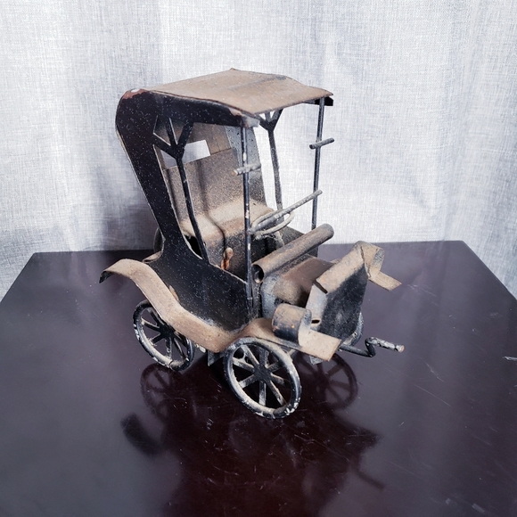 Vintage metal art musical car